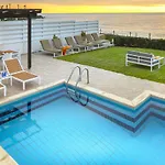 Blue Coral Villas: Exclusive Oceanfront Retreat Coral Bay