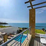 Blue Coral Villas: Exclusive Oceanfront Retreat *