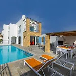 Villa Blue Coral Villas: Exclusive Oceanfront Retreat Coral Bay